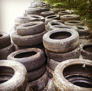 Volunteers recently cleaned up 2200 tires at Cliff Drive. Photo courtesy Brett Shoffner. 