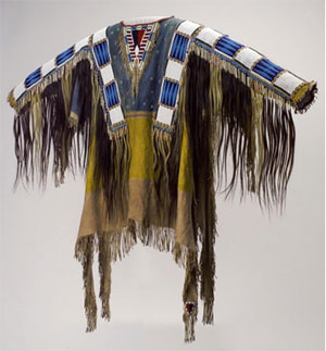 Man’s Shirt, Oglala Lakota (Teton Sioux) artists, South Dakota, 1865. Native tanned leather, pigment, human hair, horsehair, glass beads, porcupine quills, 58 x 42 ½ inches. Buffalo Bill Center of the West, Adolf Spohr Collection, Gift of Larry Sheerin, NA.202.598. 