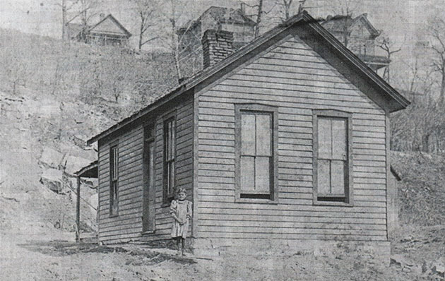 Before it became a major city park, Penn Valley was a deep ravine with 300 homes scattered across its hillsides, as seen in this photo from 1890. Photo courtesy Board of Park and Recreation Commissioners as seen in Kansas City's Parks and Boulevards. 