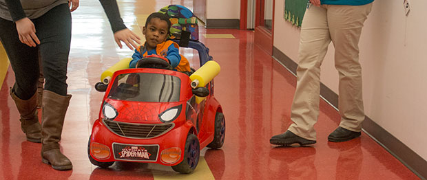 Trace Bales checked out his new “adapted car” at the Children’s Center for the Visually Impaired today. The low-cost, low-tech cars can replace powered wheelchairs for children who can’t move on their own.   