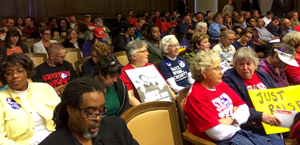 Those interested in the minimum wage issue filled the city council chamber yesterday for a hearing.
