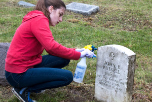 student-cleaning-grave-2