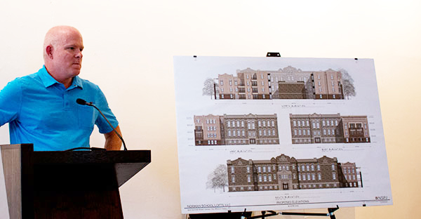 Developer Del Hedgepath explained his plans for the Norman School at a neighborhood meeting last night.