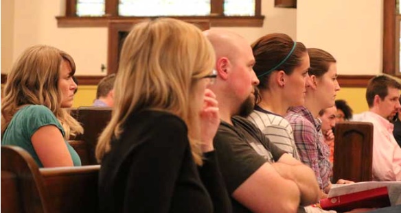 File Photo. Parents at a Midtown Community School Initiative meeting in 2014. 