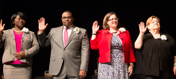 New councilmembers Alissia Canaday and Lee Barnes, fifth district and Jolie Justus and Katheryn Shields, fourth district, took the oath of office with other council members on Saturday. 