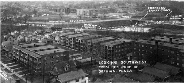 A 1926 photo of the block taken from the roof of the Sophia Plaza showing proposed street changes. In the background is the E.C. White School. 
