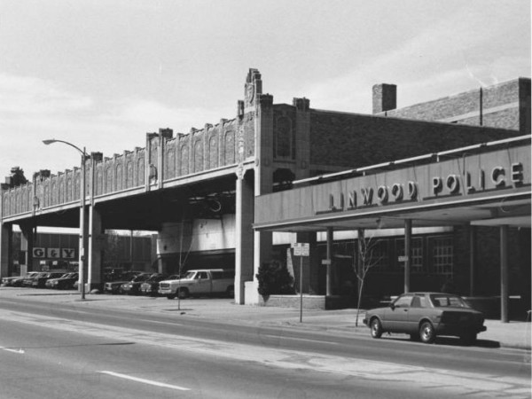 The Firestone Building at the corner of Linwood and Troost in 1984, when the Linwood Police Station was next door. 