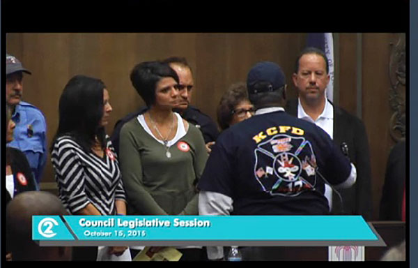 Wearing caps and tee shirts honoring their memory, Mayor James and the city council offered their condolences to the families of two fallen firefighters.