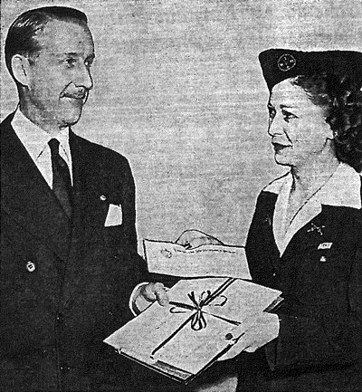 A February 1944 newspaper clipping shows Kansas City Life Insurance Company President Walter Bixby exchanging a $6.5 million check for the manuscript of Einstein's Theory of Relativity. 
