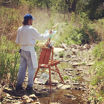 Alex Hamil paints at the 2015 Penn Valley Park Plein Air fest, where he won second place 
