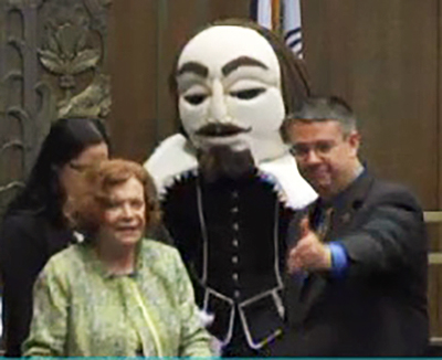 Shakespeare Festival Founder Marilyn Strauss with Mayor Pro Tem Scott Wagner and the bard at city hall.