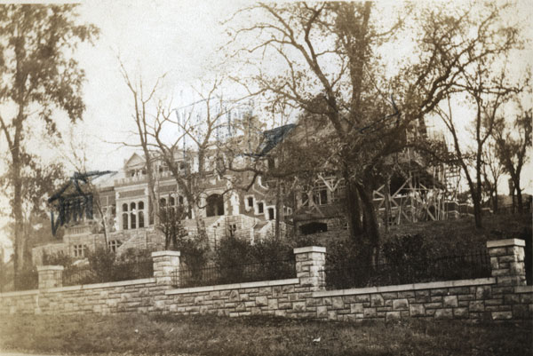 Construction began in 1919 on Epperson House, a 56-room brick mansion at the southwest corner of 52nd and Cherry. Other members of the Kansas City elite also built on the block, which was gradually incorporated into University of Kansas City, started in 1929. Like several of the other fine homes, Epperson House was transformed from a single family home into a part of the educational institution. 