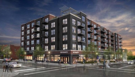 A rendering of the proposed redevelopment of Westport Road and Broadway, including a six-story apartment and commercial building. Note the change in scale between the new building and the traditional two-story Westport building on the bottom right hand side of the picture. 